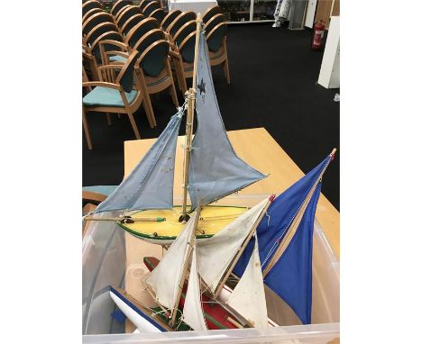 Four model sailing yachts by Star Yachts and other. Height of largest 64cm. 