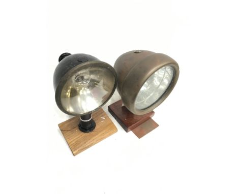 Two electric automobile spotlights: Stadium (England) Auto Spoolyte, height 21.5cm, lens diameter 11cm; C.A.V. brass light, h