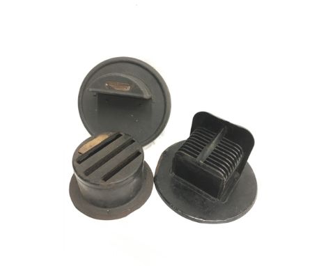 Three World War II blackout head lamp covers, one marked 'Lucas Maxlite' with remains of Lucas paper label 'Wartime Finish' (