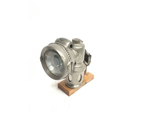 Powell and Hanmer (Birmingham) 'Chieftain' carbide bike lamp with clear glass lens and red and green reflector lenses to side