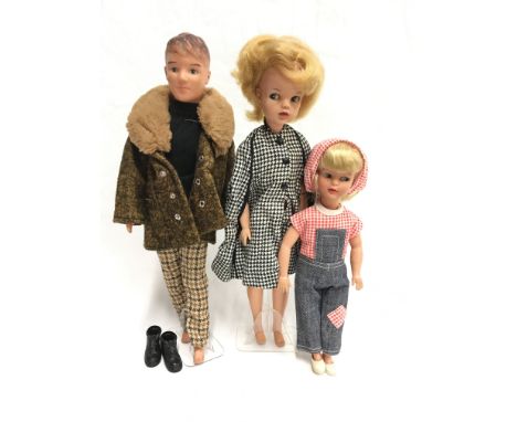 Pedigree Sindy doll with blonde hair and side-glancing eyes, head impressed 'Made in England'. Together with a Pedigree Paul 