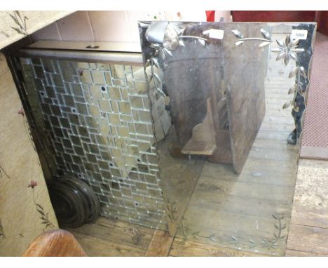 A vintage white painted display cabinet, four lighthouse glass lenses and two mirrors