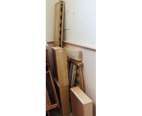 A light oak single bed frame with three drawers