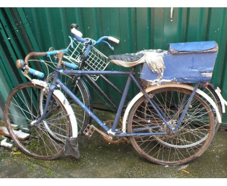 A gent's bicycle and lady's vintage bicycle