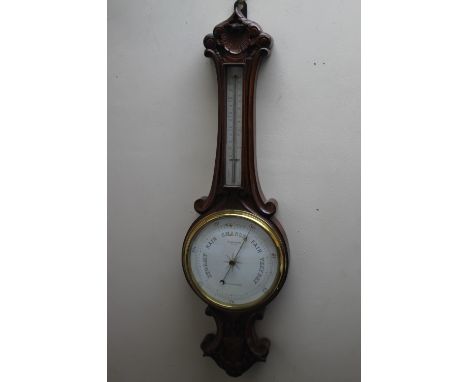 A LATE 19TH / EARLY 20TH CENTURY CARVED MAHOGANY ANEROID BAROMETER, H 79 cm