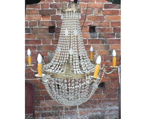 A LARGE EMPIRE STYLE SIX BRANCH CRYSTAL CHANDELIER, with multiple layers of faceted cut glass droplets, approx. H 121 cm, tog