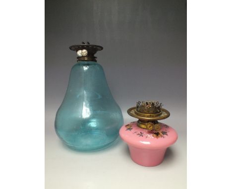 AN UNUSUAL WRIGHT AND BUTLER BLUE GLASS BODIED OIL LAMP, H 36.5 cm, together with a small pink glass bodied oil lamp having D