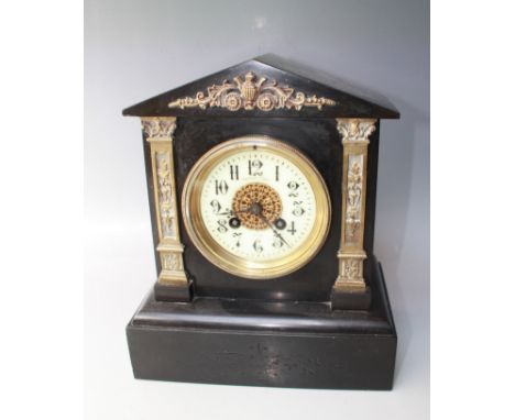 A 19TH CENTURY BLACK MARBLE MANTEL CLOCK, of architectural outline, the enamel dial, marked 'Pearce &amp; Sons Paris', H 27.5