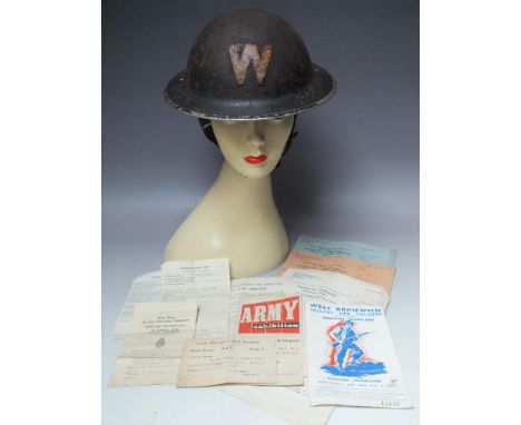 A PRE WAR BRODIE 1930 MK1 STAR HELMET, together with associated Air Raid Warden, Auxilliary Fire Service and other ephemera