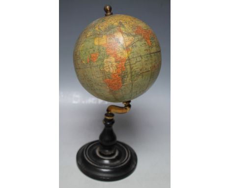 A PHILLIPS 6" TERRESTRIAL GLOBE ON TURNED WOODEN STAND, showing the orange free state, 