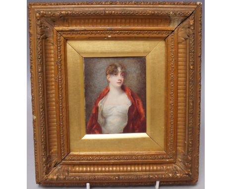 A 19TH CENTURY PORTRAIT MINIATURE OF A YOUNG WOMAN IN A WHITE DRESS, with cape over her shoulders, unsigned, watercolour on c