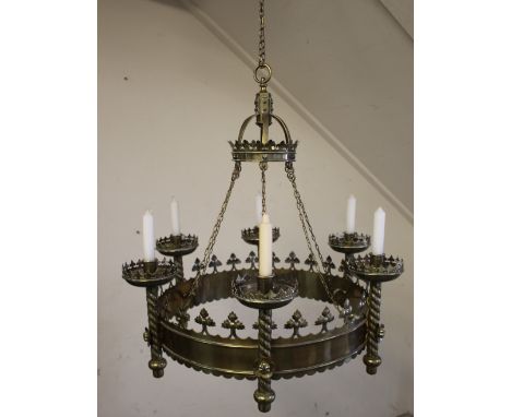 A 19TH CENTURY PUGIN STYLE GOTHIC BRASS HANGING CHANDELIER, Dia. 46 cm, fully extended H 65 cm, base and candle holders H 24 