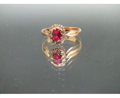 A CONTINENTAL RUBY AND DIAMOND RING, stamped to the outer side of the band 56, approx weight 3.1g,ring size P 1/2