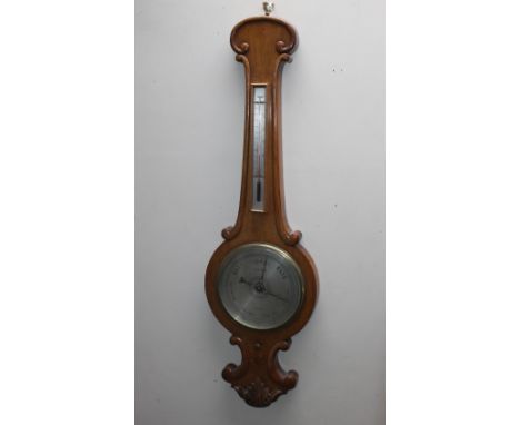 A 19TH CENTURY OAK BAROMETER, the dial marked 'Telford / Chester', carved details to the base, H 94 cm