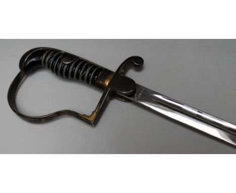 A GERMAN ARMY OFFICERS DRESS SWORD, with round pommel and sword knot, the blade by Eickhorn, Solingen, also marked Gebr. Meye