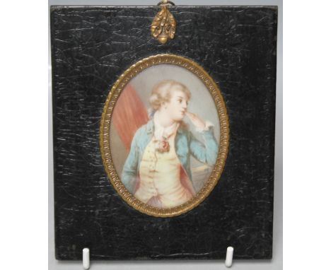 A LATE 19TH / EARLY 20TH CENTURY OVAL PORTRAIT MINIATURE ON IVORY OF A GENTLEMAN IN A BLUE COAT, unsigned, framed and glazed,