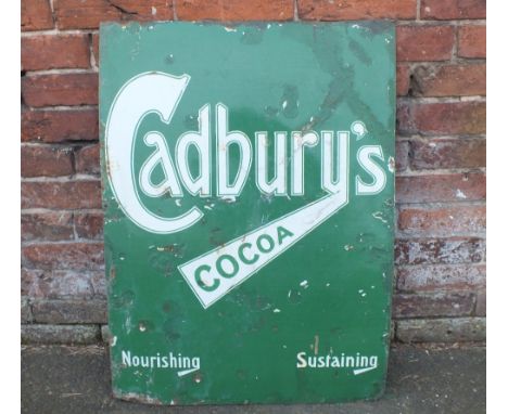 A VINTAGE ENAMEL 'CADBURY'S COCOA' ADVERTISING SIGN, with slogan 'Nourishing, Sustaining', 84 x 61.5 cm A/F