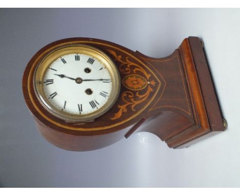 AN EDWARDIAN MAHOGANY BALLOON CASED MANTLE CLOCK, with inlaid decoration, circular enamel dial with Roman numerals, the 8 day
