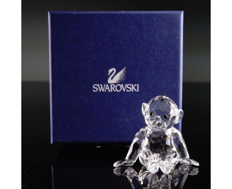This Swarovski Crystal Chimpanzee figurine was designed by Edith Mair and introduced in 1998 as part of the Swarovski Silver 