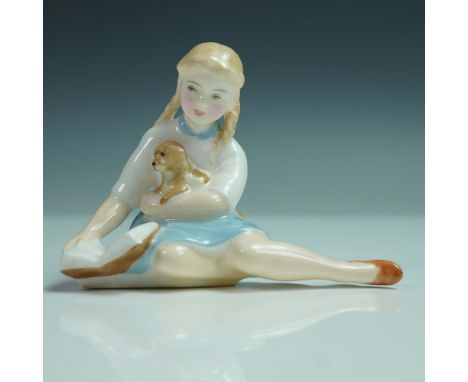 Issued as part of Royal Doulton's beloved Child Study series, this hand-painted figurine captures a tender moment of childhoo