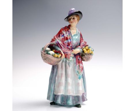 Modeled as a gypsy vendor; colorful fringed shawl, apron and skirt. Baskets are filled with fruits, vegetables and flowers. R