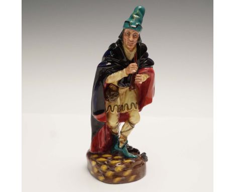 From the Harradine Classics series.  Hand painted figure depicting the legendary Pied Piper wearing a flowing black and red c