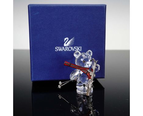 Lead crystal figurine part of the When We Were Young collection. Kris bear wears a ribbon of green and red fabric around its 