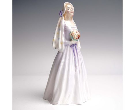 The Royal Doulton figurine Sweet Maid (HN2092) portrays a demure young woman standing with a soft expression, in a soft laven