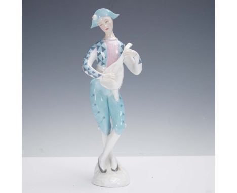 Issued in 1956, Harlequin (HN2186) by Royal Doulton captures a whimsical musician in mid-performance, cradling a mandolin and
