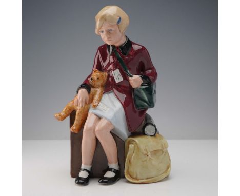 This poignant Royal Doulton porcelain figurine, titled The Girl Evacuee (HN3203), is part of the "Children of the Blitz" seri