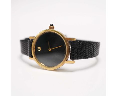 A Swiss-made Movado quartz wristwatch featuring a minimalist black dial with a single gold dot at the 12 o'clock position, co