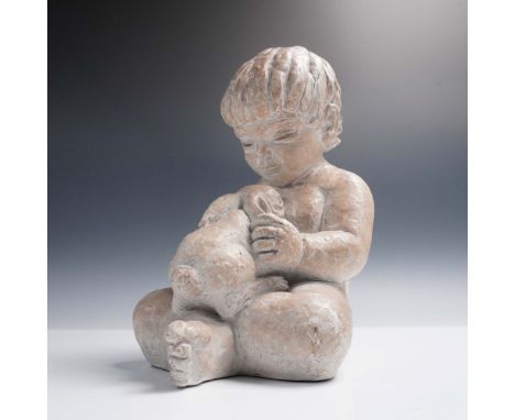 Vintage Austin Productions sculpture depicting a seated boy lovingly clutching a teddy bear, designed by artist Miro Musulin.