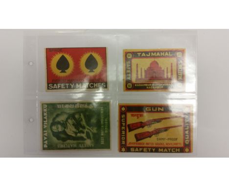 MATCHBOX LABELS, unused packet labels, inc.  Spade, Taj Mahal, Gun, Australian Aboriginal, Ponnappa, Valimark, Mayil, Shark, 