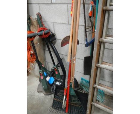 A large quantity of tools including strimmer.