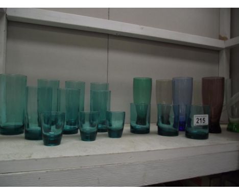 A quantity of vintage coloured drinking glasses