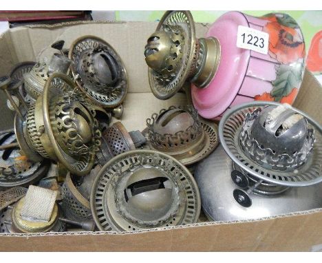 A quantity of Victorian oil lamp burners and fonts including Hinks, Postlethwaite etc.,