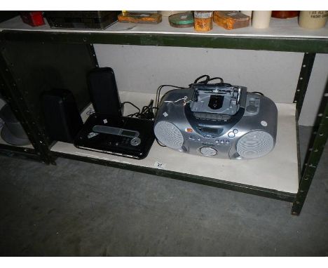 A Panasonic cd player and one other item.