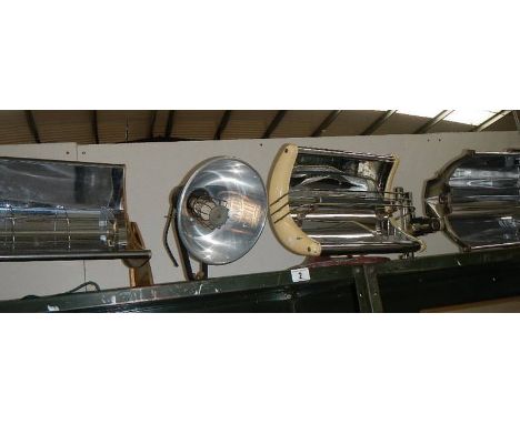 4 vintage electric heaters.