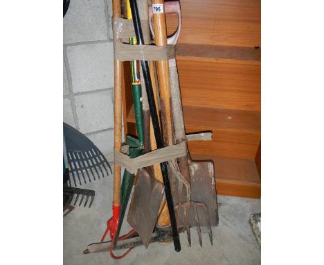 A quantity of garden tools.