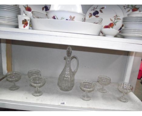A good set of 6 vintage dessert dishes and a claret jug