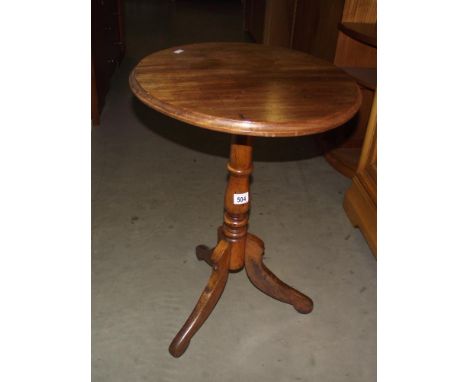A Victorian mahogany tripod side table