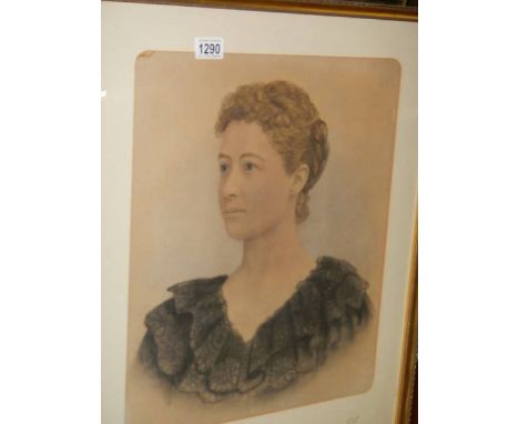 A portrait print of a lady.