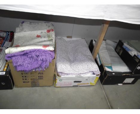 A large lot of bedding, material, curtains etc. in 5 boxes
