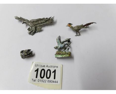 4 silver bird brooches circa 1940/50's being eagle, enamelled and stone set pheasant, a swan and a mother bird feeding her ch