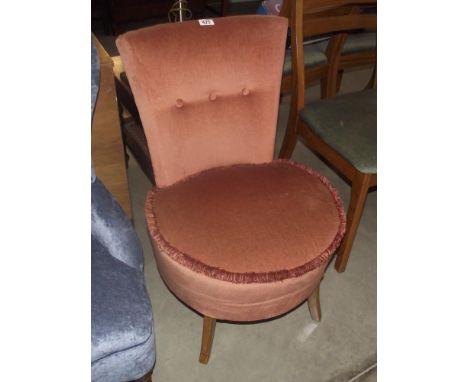 A button upholstered nursing chair