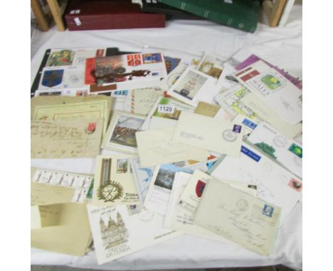 A box of miscellaneous first day covers FDCs etc including coin sets