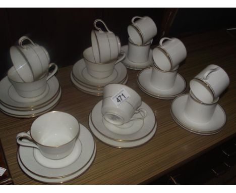 A quantity of Noritake ivory china, cup, saucer, tea plate trios