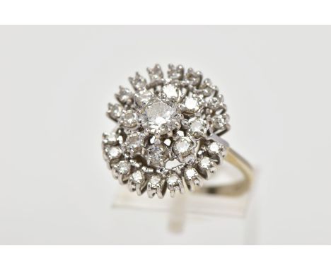 A MODERN DIAMOND CLUSTER RING, centring on a modern round brilliant diamond, estimated weight 0.50ct, enclosed within a board