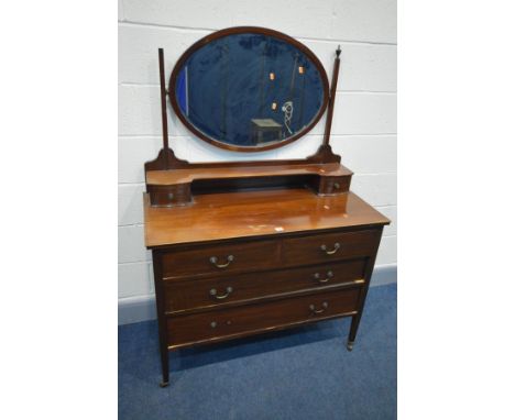 AN EDWARDIAN MAHOGANY AND STRING INLAID DRESSING CHEST, with an oval swing mirror, and two over two drawers, width 107cm x de