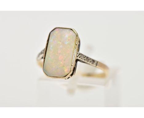 AN OPAL AND DIAMOND RING, the rectangular opal within a milligrain setting with diamond detail to the shoulders, ring size O,